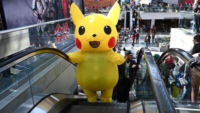 A cosplayer as Pikachu from the Pokemon franchise. AFP