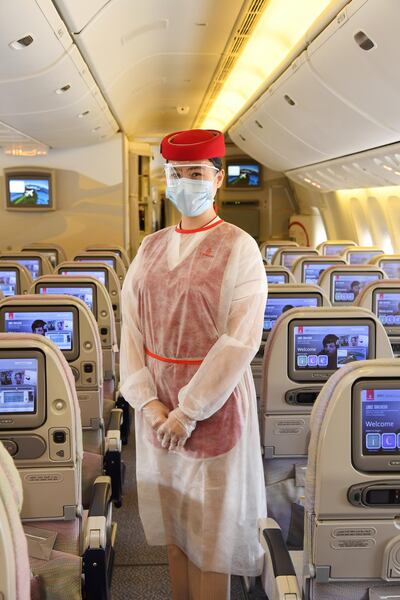 Expect all Emirates crew to be wearing PPE on flights, passengers must wear face masks for the duration of flights. Courtesy Emirates
