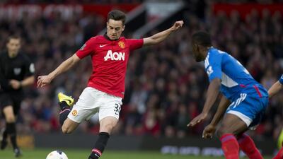 Manchester United player Tom Lawrence, left, takes a shot against Hull City on Tuesday. Jon Super / AP / May 6, 2014