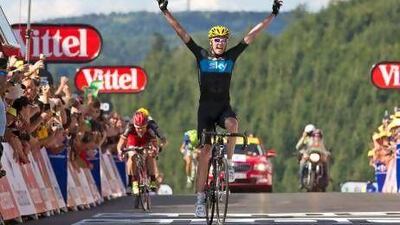 Christopher Froome took the Stage 7 win, finishing ahead of Cadel Evans of Australia, left, but Bradley Wiggin's third-place finish was enough to give him the yellow jersey of the overall leader.
