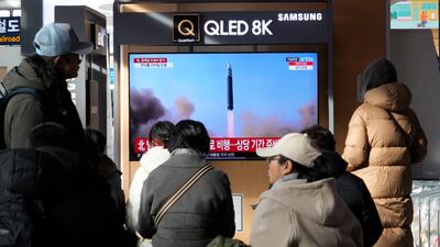 A TV screen shows a file image of North Korea's missile launch during a news program at the Seoul Railway Station in Seoul, South Korea, Monday, December 18, 2023. AP