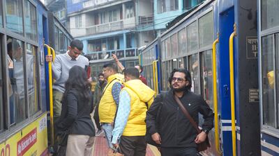 Passengers at Ghum station. Every year, more than a million tourists visit the area and 150,000 take the rail 'joyride'