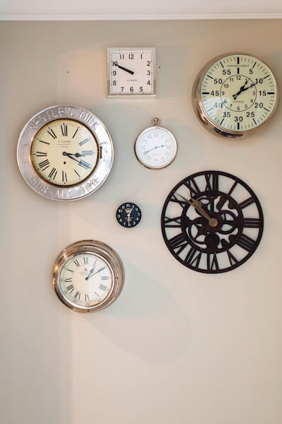 A distinctive wall of clocks catches our eye on the way to the downstairs powder room. Anna Nielsen / The National