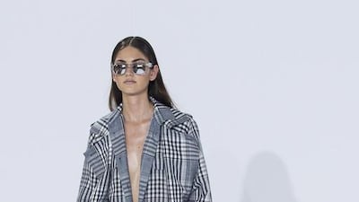 Cropped trousers (Temperley): Hardly a full-length pair of trousers was to be seen in London: summer suits were paired with shorts, culottes and, most commonly of all, casually turned-up, loosely tapered trousers. One thing is for sure: skinny is out and wide, flapping pants are in. Amanda Wakeley set the tone with her relaxed tailoring and Temperley London picked up where she left off, with laid-back checked trousers teamed with plimsolls and long, loose, silky coats. They ranged from wide calf-length palazzo-style trousers with matching waistcoats and tux jackets in creamy crepe to super-casual rolled-up pyjama pants. Carl Court / AFP