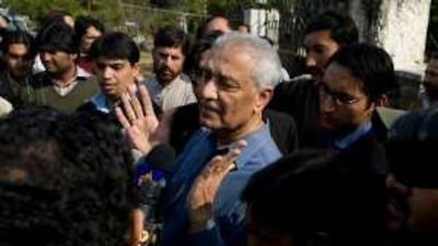 Abdul Qadeer Khan speaks to reporters outside his home in Islamabad after his sentence of house arrest was lifted in February.