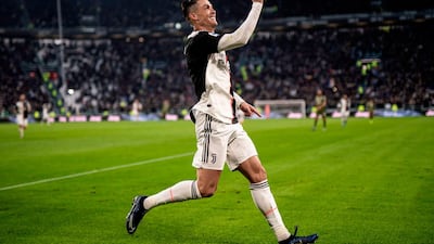 Cristiano Ronaldo celebrates after scoring his third goal. AFP