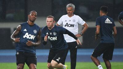 Wayne Rooney believes new Manchester United manager, Jose Mourinho, has made "great signings" so far. Greg Baker / AFP