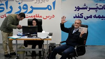 Masoud Pezeshkian with his identification document while registering as a candidate for the June 28 presidential election in Tehran. AP