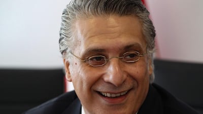 Nabil Karoui, the imprisoned Tunisian media magnate and presidential candidate is pictured after submitting his candidacy to Tunisia's electoral commission in the capital Tunis on August 2, 2019. AFP / Hasna