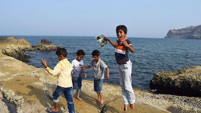 Yemeni boys play in the Crater district of the the southern Yemeni port city of Aden on September 4, 2015. Saleh Al Obeidi/AFP Photo
