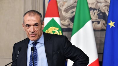 Carlo Cottarelli addresses a press conference at the Qurinale presidential palace on May 28, 2018 in Rome after Italian President gave him mandate to form a government. Andreas Solaro / AFP