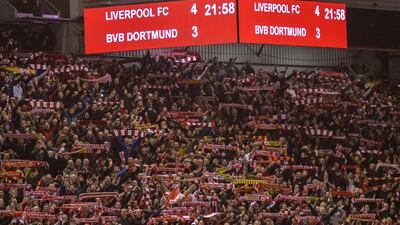 Liverpool fans celebrate after their team’s victory against Borussia Dortmund. Peter Powell / EPA