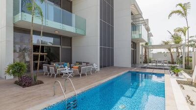 An expensive Dubai villa wouldn't be complete without a swimming pool. Courtesy LuxuryProperty.com