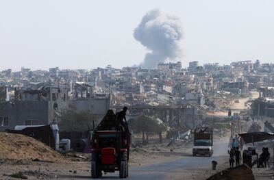 Smoke rises over Khan Younis in southern Gaza after Israeli bombardment. Reuters