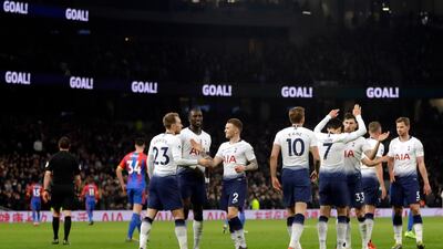 Tottenham's Christian Eriksen, foreground left, celebrates after scoring his side's second goal. EPA