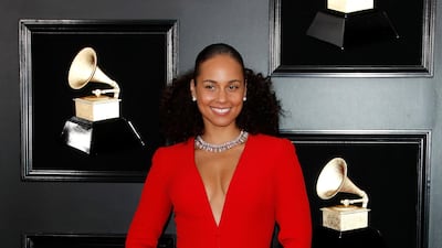 Alicia Keys in timeless red Giorgio Armani. Photo: EPA