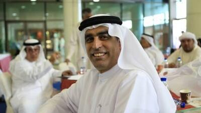 Ismail Abdul Rahman witnesses the voting at the Airport Expo polling station in Dubai on Saturday. Candidates in other emirates have demanded a recount.