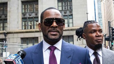 R Kelly leaving court in March 2019. AP