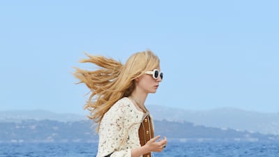 Heavy biker boots balance out the mini dress and hand-crocheted jacket