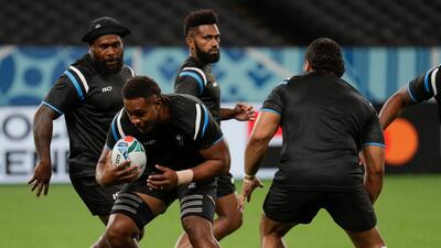 Fiji player Viliame Mata, with the ball, was working as a joiner before being spotted by the country's sevens coach and winning Olympic gold in 2016. AP