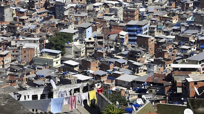 Those living in Rio's favelas have seen no benefit from the city's glittering Olympic Games. Barbara Walton / EPA