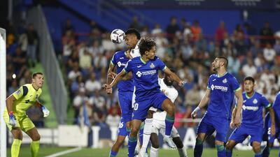 Eder Militao heads the ball to score the first goal for Real Madrid against Getafe. EPA