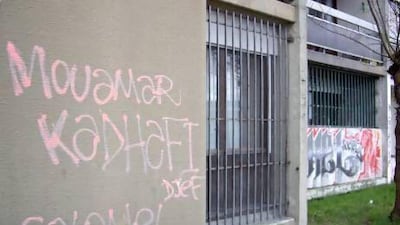 Graffiti on a building in Montfermeil, outside Paris, which reads ‘Moamar Ghadafi’, Montfermeil is an enclosed world, where many residents don't speak French, where delinquency soars, and where the unemployment rate is an estimated 40 per cent.