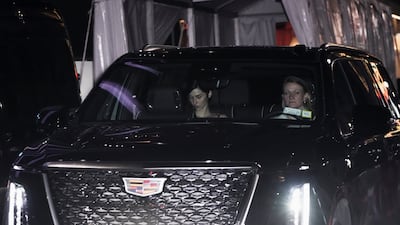 Singer-songwriter Gracie Abrams is driven from the wedding venue. Reuters