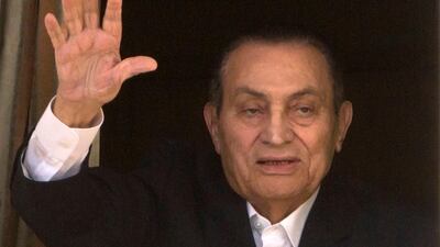 April 25, 2016: Egyptian President Hosni Mubarak waves to his supporters from his room at the Maadi Military Hospital, where he is hospitalised, in Cairo, Egypt. AP