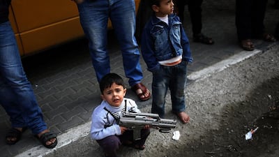 A Palestinian boy attends a Hamas demonstration in Gaza. Moahmmed Saber / EPA