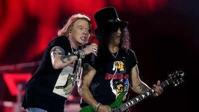 Axl Rose and Slash, lead singer and lead guitarist of Guns N' Roses, perform at the Du Arena in Abu Dhabi. Reuters
