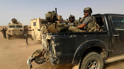 The US-backed Syrian Democratic Forces launched an offensive against ISIS in eastern Syria on September 10, 2018. AFP