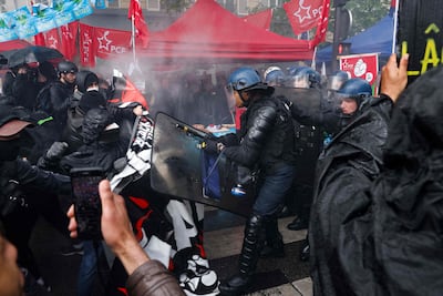 Protesters clash with French riot police. AFP
