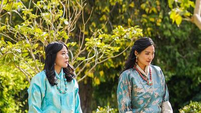 Bhutan's Queen Jetsun Pema and Princess Euphelma arrive wearing traditional Bhutanese outfits