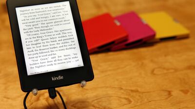 Amazon's Kindle Paperwhite tablet sits on display after a news conference in Santa Monica, California. The online retailer will soon open its first physical bookshop in Seattle. Patrick Fallon / Bloomberg