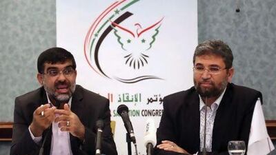 Imaduldeen al Rashid (left) and Fedaa Majzoub of the Syrian National Salvation Congress at a news conference in Istanbul last month. Murad Sezer / Reuters