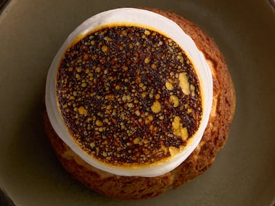 Choux pastry with hazelnut ice cream, blackberry compote and white chocolate ganache. Photo: L'eto