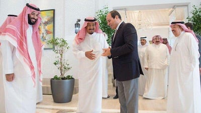 Saudi Arabia's King Salman greets Egyptian President Abdel Fattah Al Sisi in Neom. Saudi Press Agency.