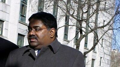 A profanity-laced phone tap of accused hedge fund manager Raj Rajaratnam, above, and his brother was played for jurors by prosecutors in court yesterday.