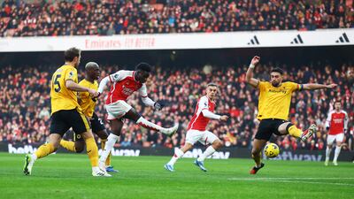 Arsenal's Bukayo Saka scores their first goal against Wolves. Reutesr