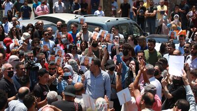 Palestinian activists protest against the Palestinian president Mahmoud Abbas following the death of human rights activist. EPA