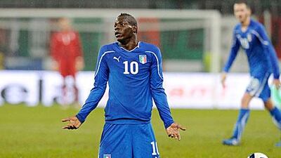 Mario Balotelli’s antics earned him a red card with Manchester City and also got him dropped from his national team. Claudio Villa / Getty Images