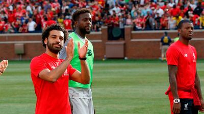 Mohamed Salah took time out from Liverpool's tour of the United States to meet a Syrian refugee teenager suffering from muscular dystrophy. AFP