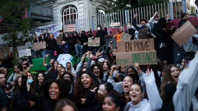 French high school students gather outside the Lycee Charles Peguy high school in Paris as part of a nationwide day of demonstrations and blockades. REUTERS