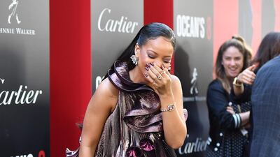 Rihanna looks like a walking botanical delight in a blooming Givenchy metallic dress. AFP