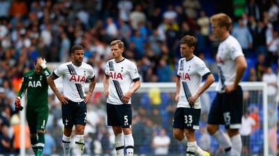 Tottenham Hotspur players show their frustration after a 2-2 draw in their Premier League match against Stoke City at White Hart Lane on August 15, 2015 in London, United Kingdom. Julian Finney / Getty Images