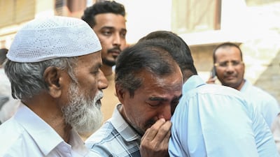 Relatives of victims killed in Saudi Arabia mourn in Hyderabad, India. AFP