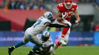 Kansas City Chiefs’ Travis Kelce and Detroit Lions’ Glover Quin in action. Action Images via Reuters / Matthew Childs