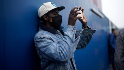A member of the public films the action on 'The Batman' set with his phone. Getty Images