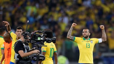 Brazil's player Dani Alves celebrates at the final whistle. AFP